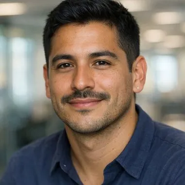 Early-thirties Latin man, short black hair, mustache, calm expression, navy top